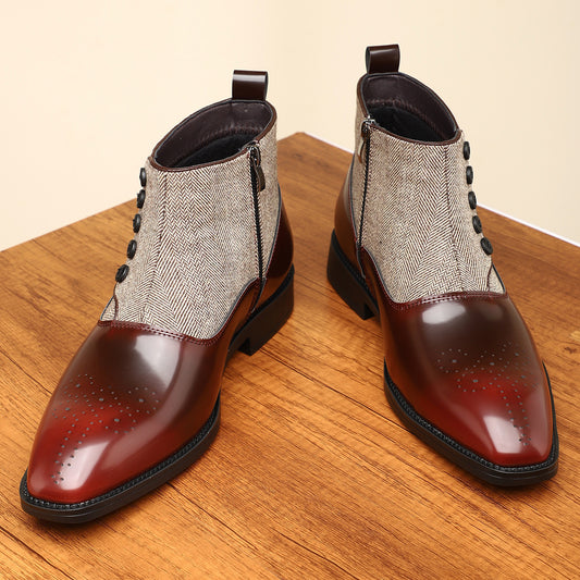 Pair of brown leather boots with herringbone pattern on a wooden surface