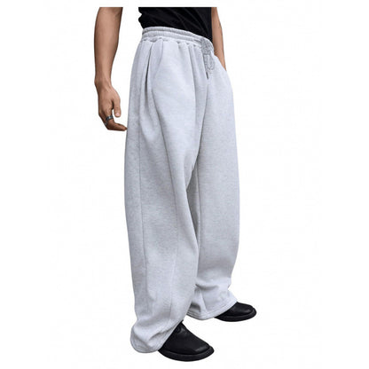 Men's light gray sweatpants with elastic waistband and drawstring, relaxed wide legs