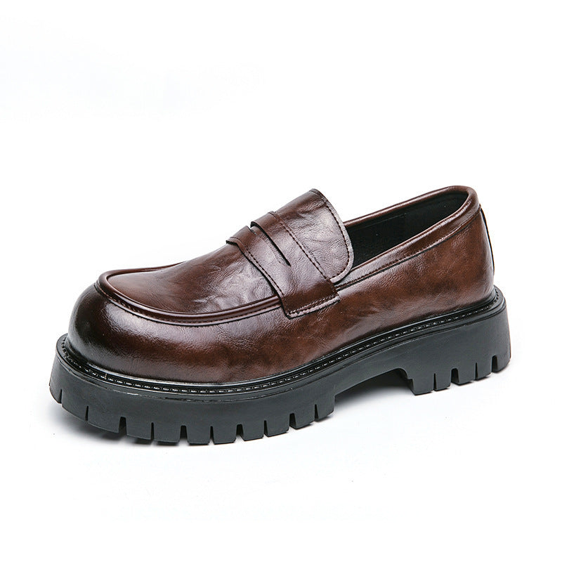 Brown leather slip-on loafer with strap detail and chunky tread sole