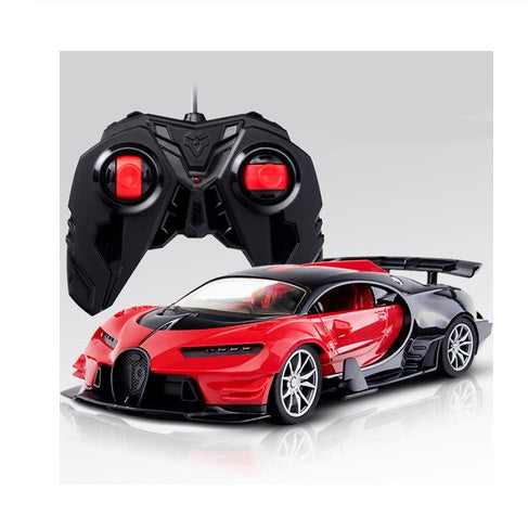 RC racing car model in red with remote controller, side-front three-quarter view