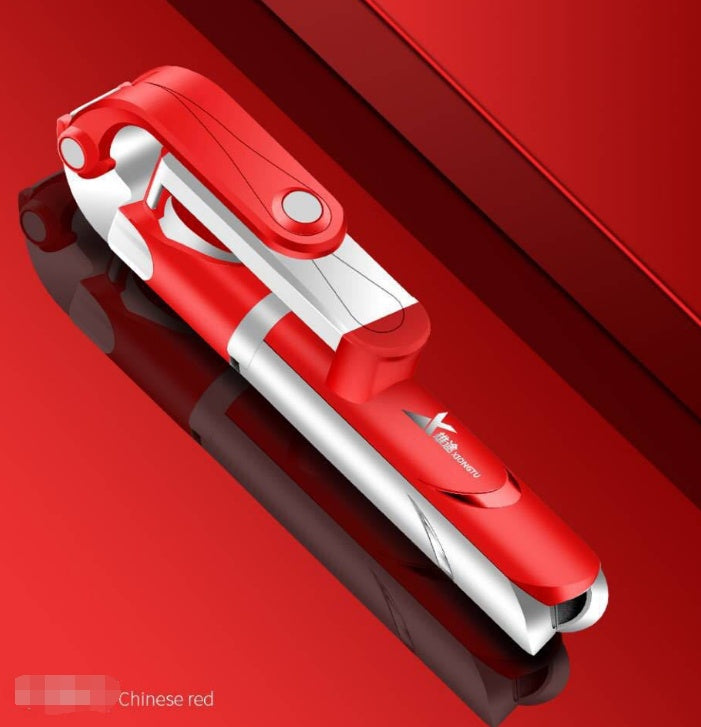 Red and white selfie stick and tripod with phone clamp and base