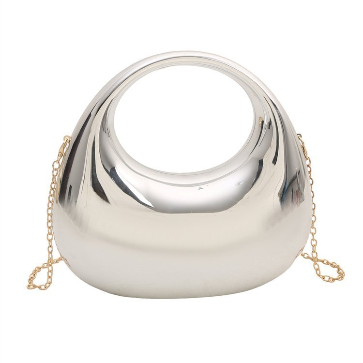 Silver half-moon acrylic crossbody bag with chain strap and glossy curved shell
