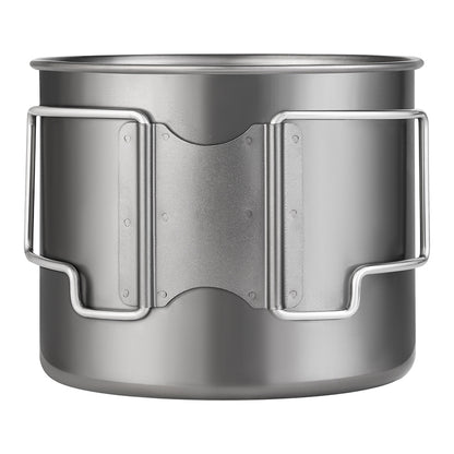 Grey titanium camping cup with foldable handles and grip channels, close-up