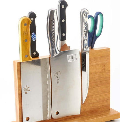 Wood magnetic knife holder with multiple upright knife slots holding knives