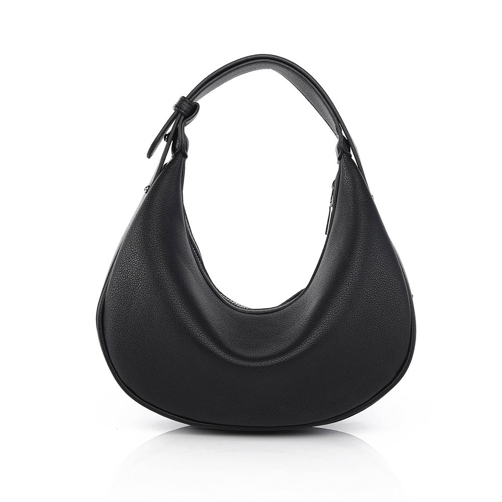 Black hobo bag with curved open top and attached drawstring tabs