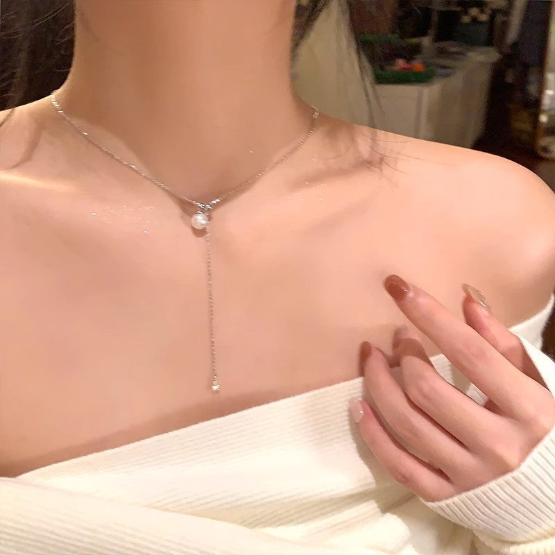 Pearl drop collar necklace with slim chain and dangling bead charm