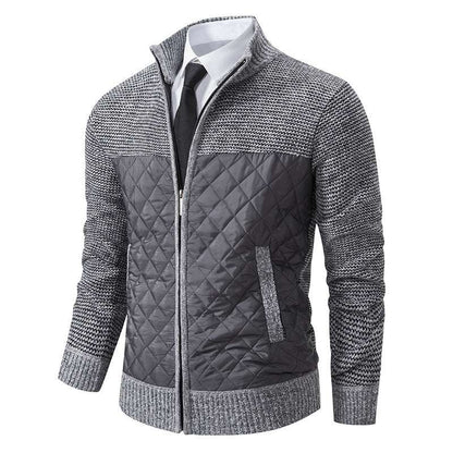 Gray quilted jacket with patterned sleeves on a white background