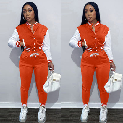 Orange baseball jacket and jogger pants set with white contrast sleeves and striped cuffs