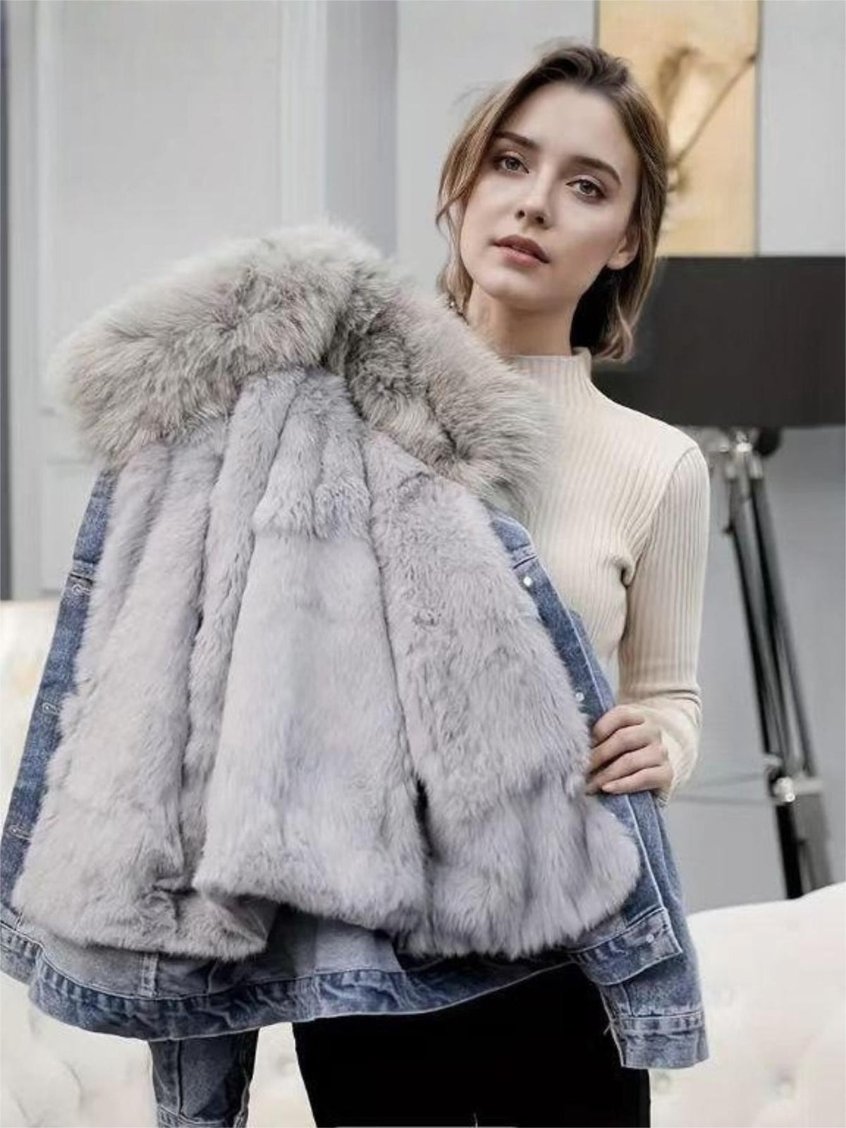 Oversized light blue denim jacket with thick gray faux fur collar, front button closure