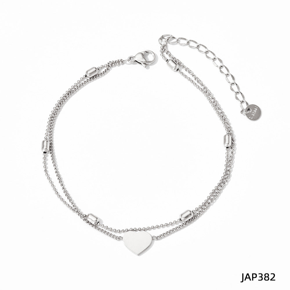 Silver heart charm anklet with linked chain and small round clasp