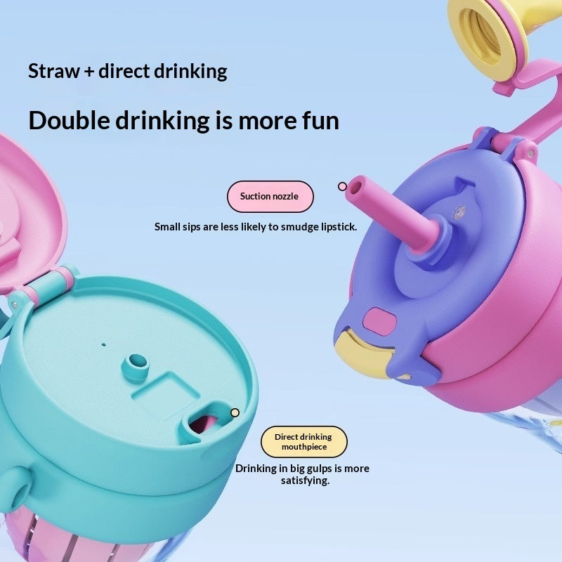 Kids sippy straw cup with suction nozzle, blue and pink lid, direct-drink spout detail