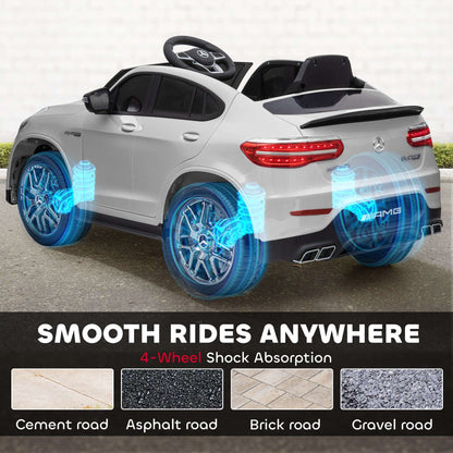 White kids 12V ride-on SUV rear view with glowing blue wheel lights