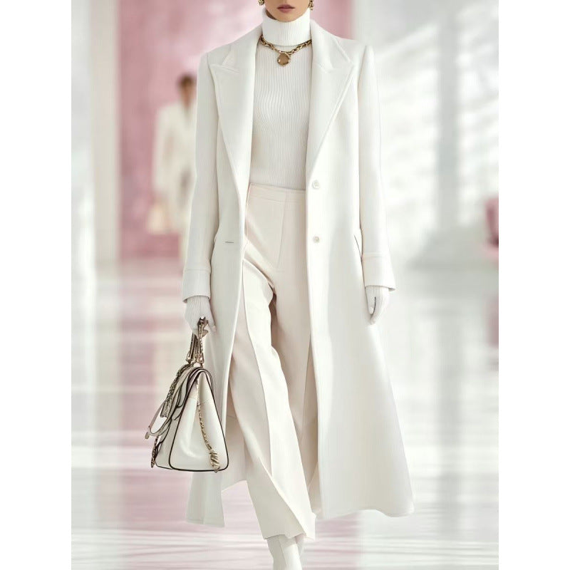 Women’s mid-length wool coat, white, notched lapels, button front, side pockets