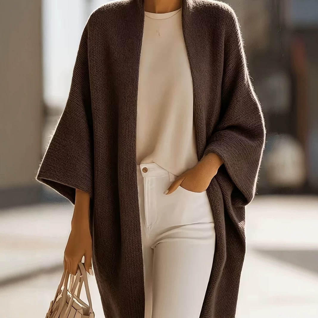 Dark brown knitted shawl jacket with draped open front and short batwing sleeves