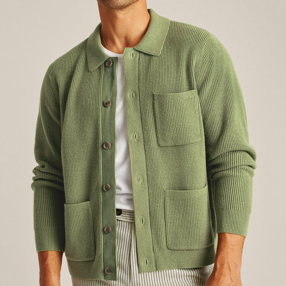 A man modeling a thick, high-density knit sweater featuring an integrated contrast shirt collar, perfect for a smart-casual professional look.