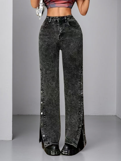 High-waisted dark jeans with slightly flared legs and silver side buckle accents