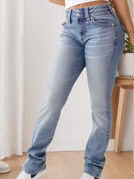 A woman modeling retro-washed light blue wide-leg jeans with a high-waisted slim-fit cut, featuring a smooth built-in zipper and flowy leg silhouette.