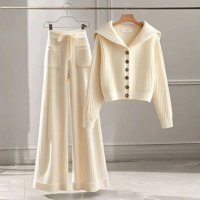 Cream ribbed knit hooded cardigan top with dark buttons and matching straight-leg pants