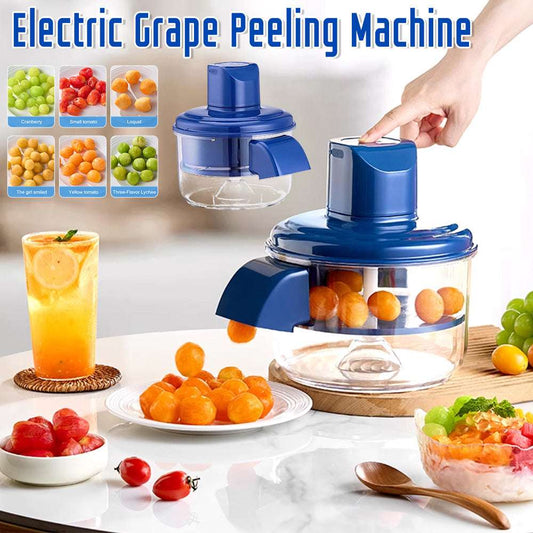 Electric grape peeling machine with fruits and a glass of juice on a table.