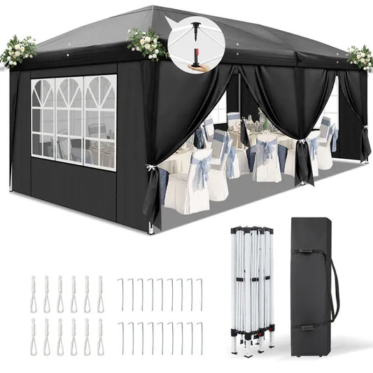 Black 10x20 pop up canopy tent with mesh windows and side panels set up outdoors