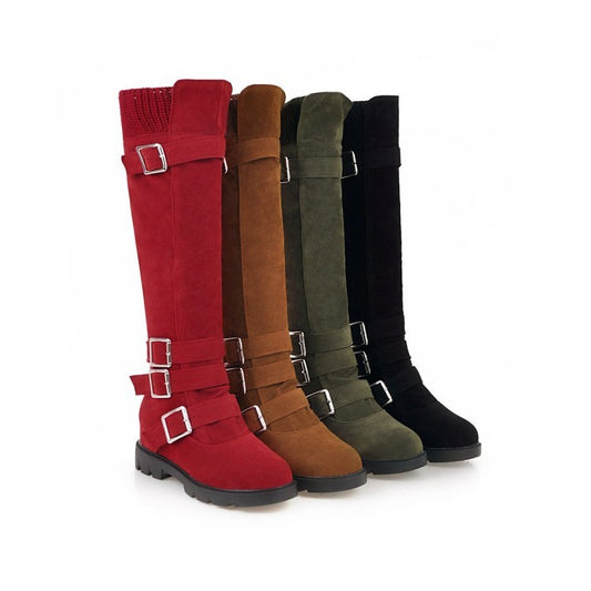A collection of high top martin boots for women in red, green, black, and brown colors with belt buckles and side zippers.