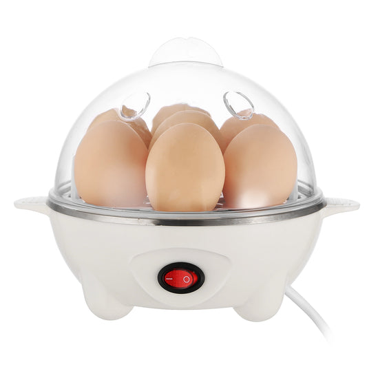 Compact electric egg cooker with 7 hard-boiled eggs inside, featuring a transparent lid and a measuring cup on a kitchen countertop