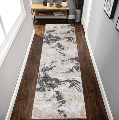 Abstract runner rug with gray, black, and beige marble-like swirls, textured look