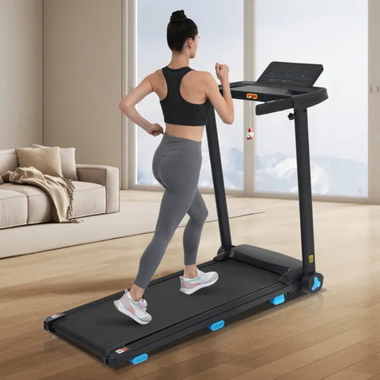 Foldable treadmill with incline and 3.0HP motor shown in a home gym setting.