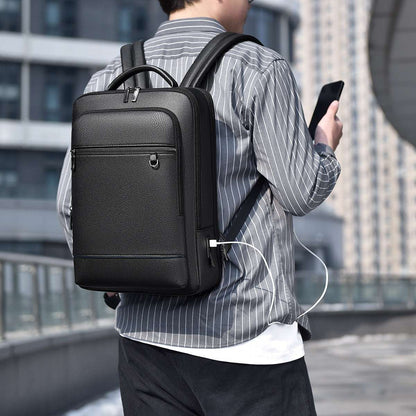 Black multifunction computer backpack with top handle and adjustable shoulder straps