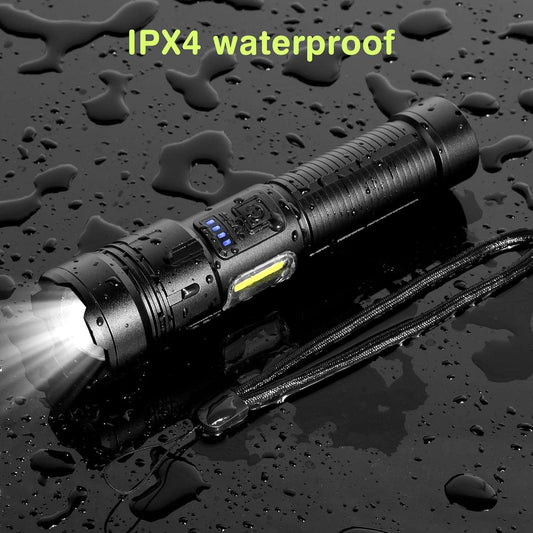 High-power LED rechargeable flashlight illuminating a dark forest path during a night hiking trip