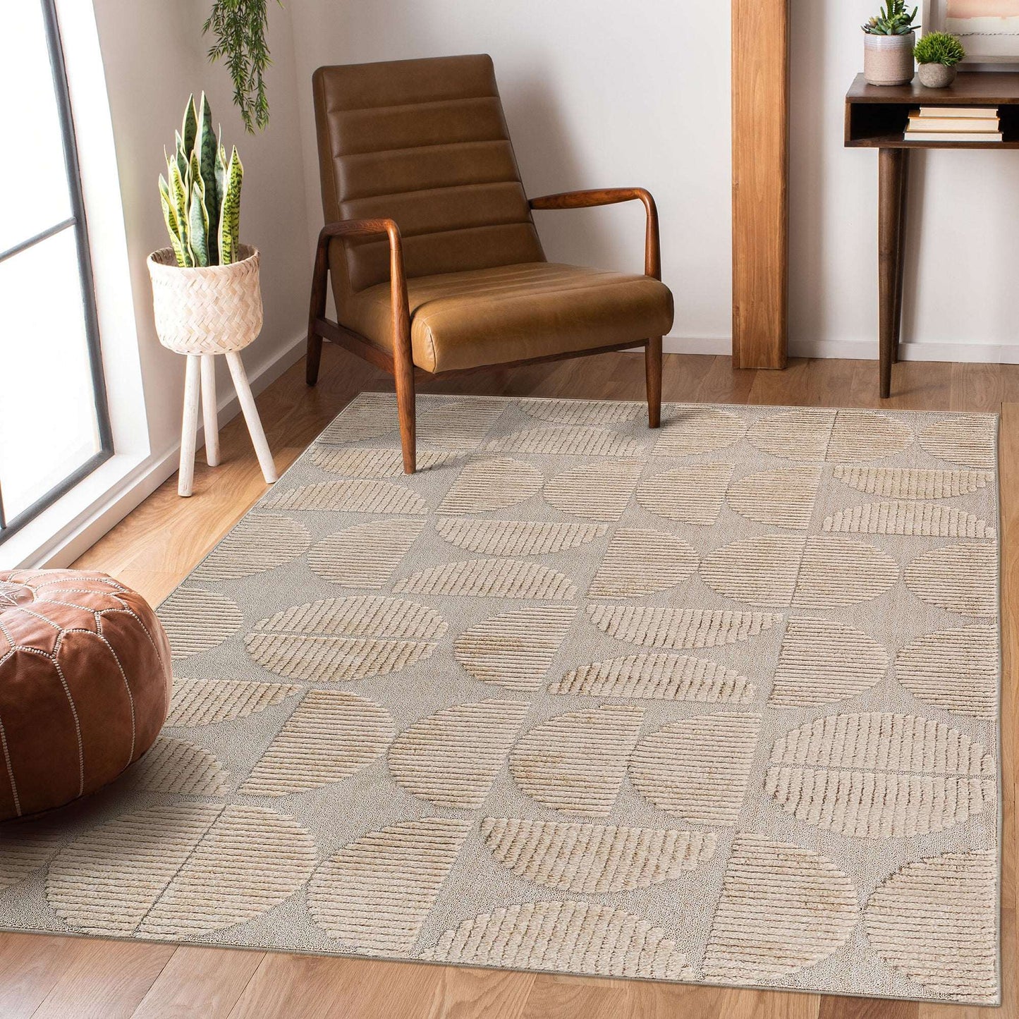 Beige geometric area rug with raised pattern and textured surface