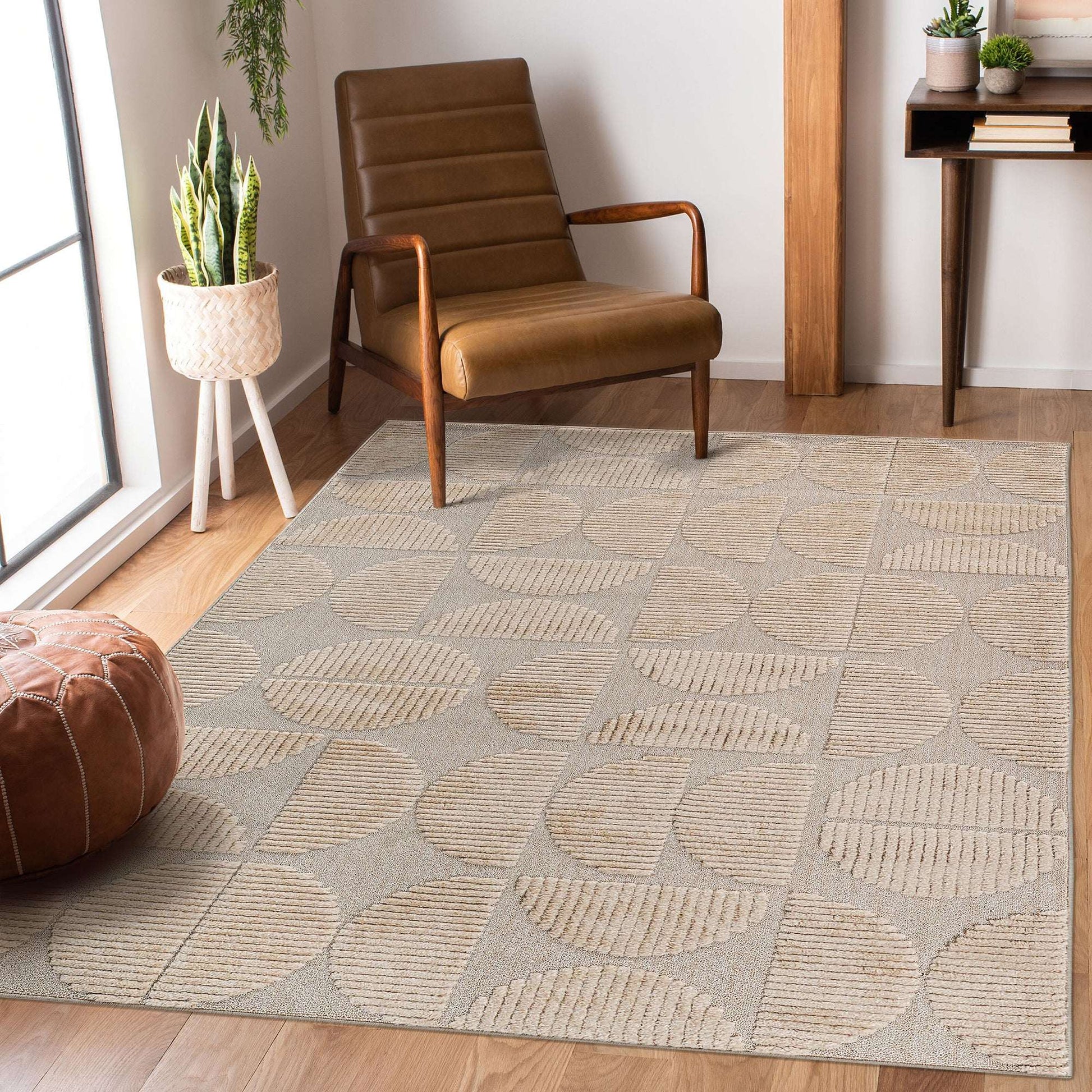 Beige geometric area rug with raised pattern and textured surface