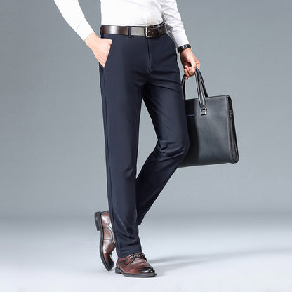 Navy men's casual pants with belt, tapered legs and side pockets