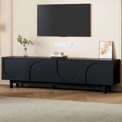 Black TV stand with arch cabinet doors and wide media console base