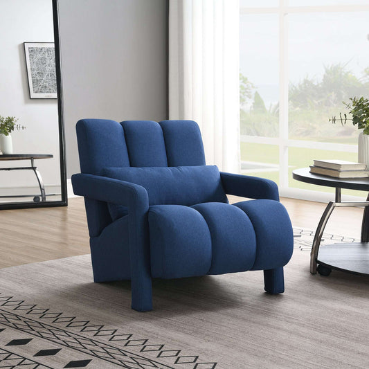 Modern navy blue upholstered accent chair featuring linen fabric and a matching support pillow, styled for a contemporary living room.