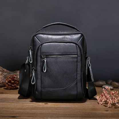 Men's leather business bag, black with top handle and front zipper pocket