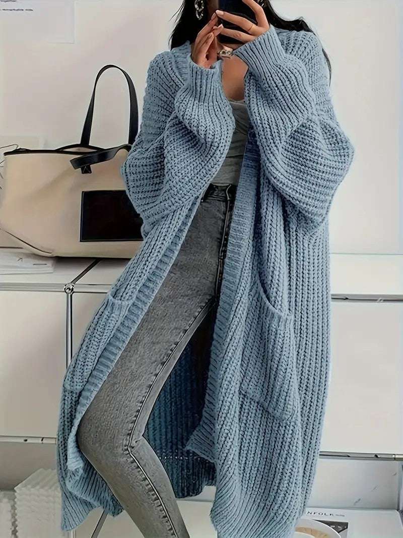Light blue knit cardigan coat with long sleeves, open front, loose fit
