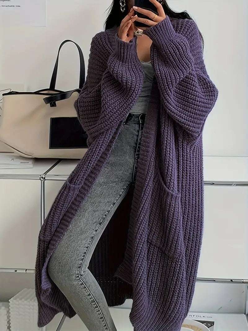 Long knit cardigan coat in purple with open front, long sleeves, chunky textured knit