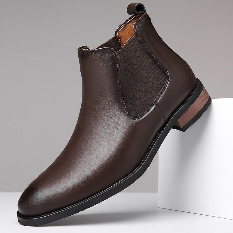 Dark brown pointed leather Chelsea boot with elastic side gore and block heel