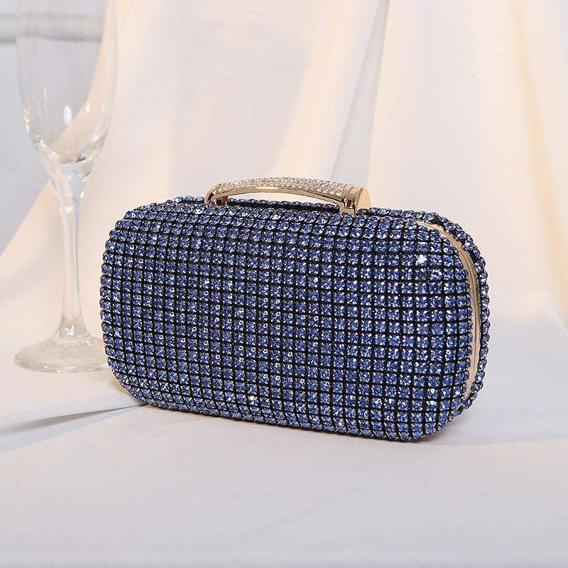 Blue rhinestone clutch bag with gold-tone top handle and chain strap