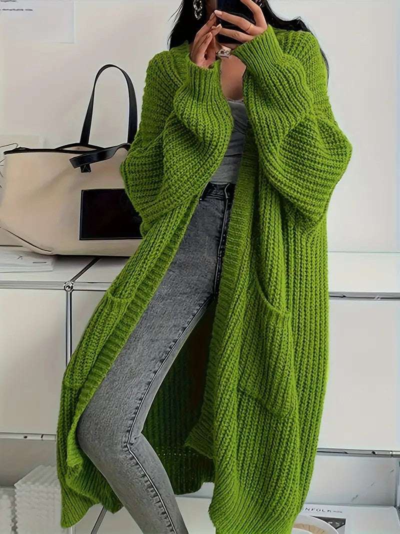 Long knit cardigan coat in lime green with open front, long sleeves, chunky ribbed knit