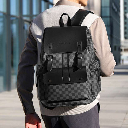 Black checkered office backpack with front flap, buckles, and two straps