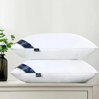 White bed pillow set, two square sleeping pillows with blue label on edge