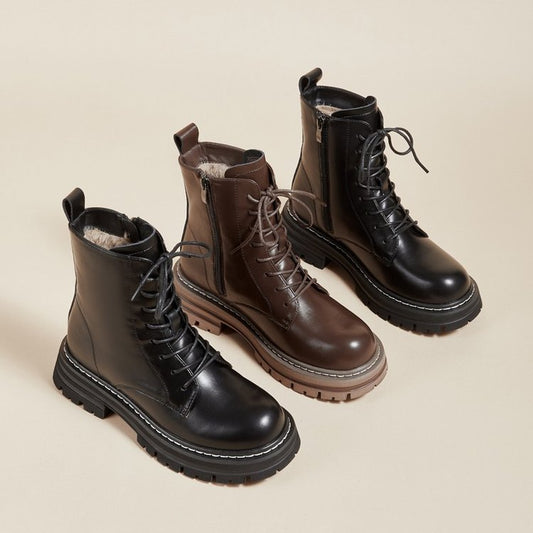Three pairs of retro style ankle boots with a platform sole, lace-up front, and varying colors: black, brown, and dark brown.