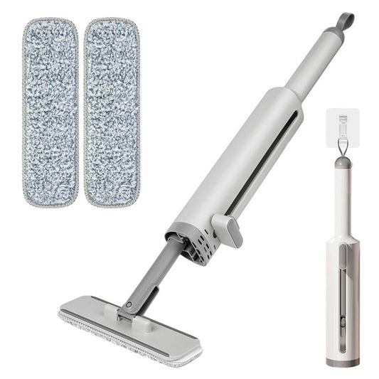 Cleaning tool set with a spray head, two microfiber cloths, and a holder on a white background