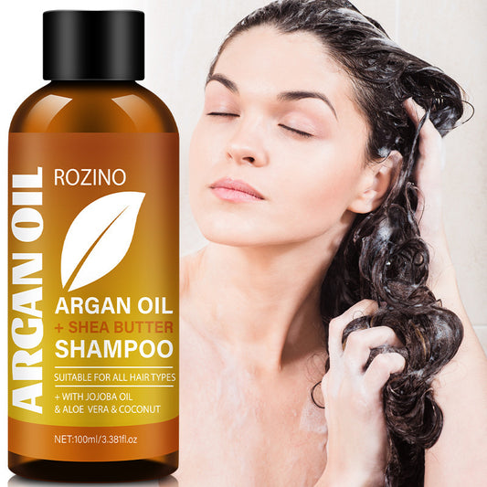 Rozino Argan Oil Shampoo bottle with a woman with wet hair on a white background