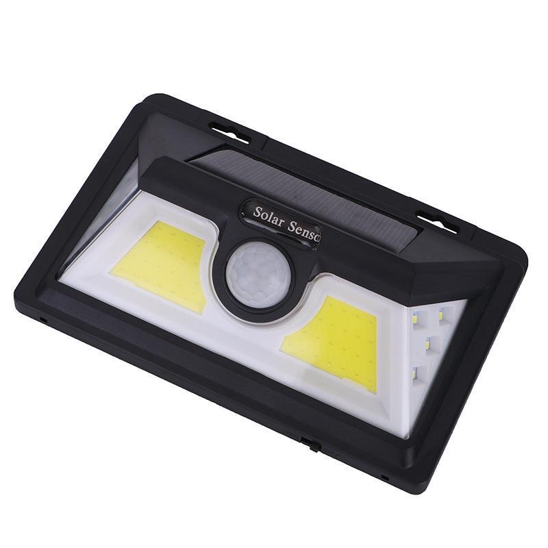 Solar-powered LED light with motion sensor on a white background