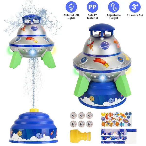 Toy spaceship with water sprayer and LED lights on a white background