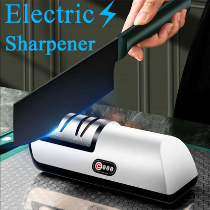 Electric knife sharpener with a hand holding a knife above it, set against a dark background.
