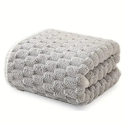 Waffle bath towel set, folded stack of gray towels with waffle texture